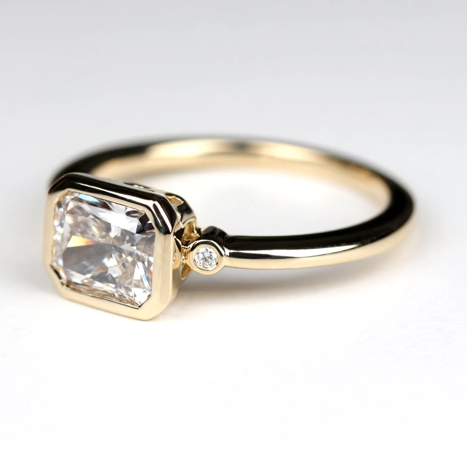 East West Openwork Bezel Three Stone Ring with Diamond Foundry Diamond