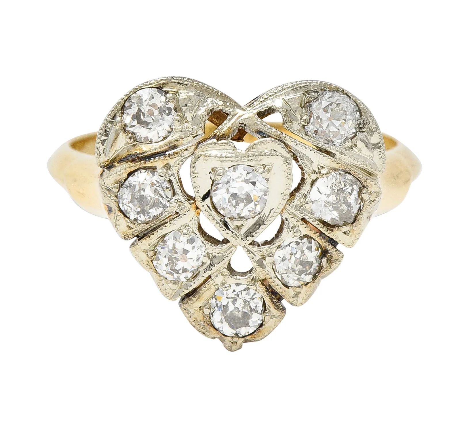 Edwardian 0.74 CTW Diamond Platinum-Topped 14 Karat Gold Antique Heart Ring