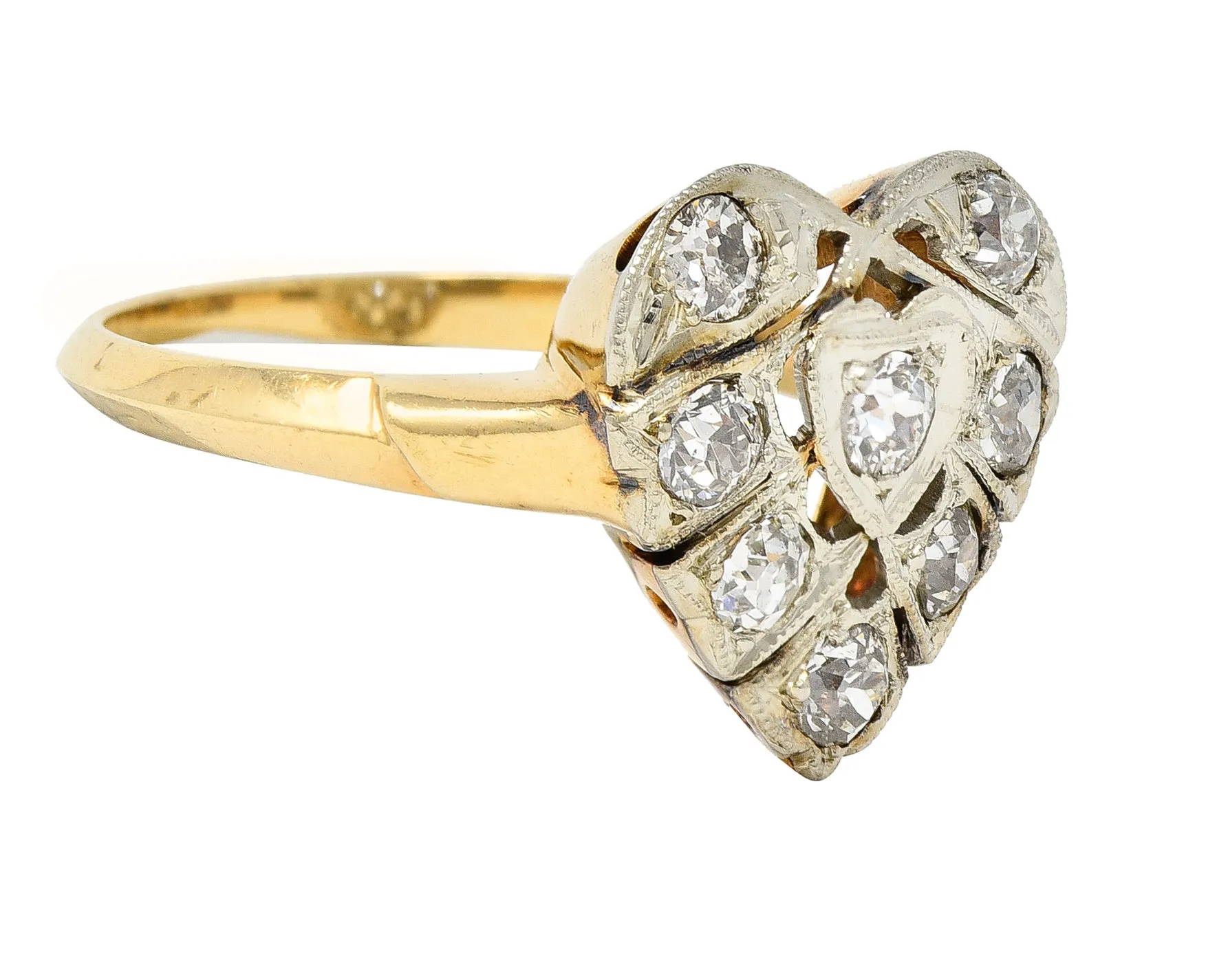 Edwardian 0.74 CTW Diamond Platinum-Topped 14 Karat Gold Antique Heart Ring