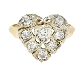 Edwardian 0.74 CTW Diamond Platinum-Topped 14 Karat Gold Antique Heart Ring