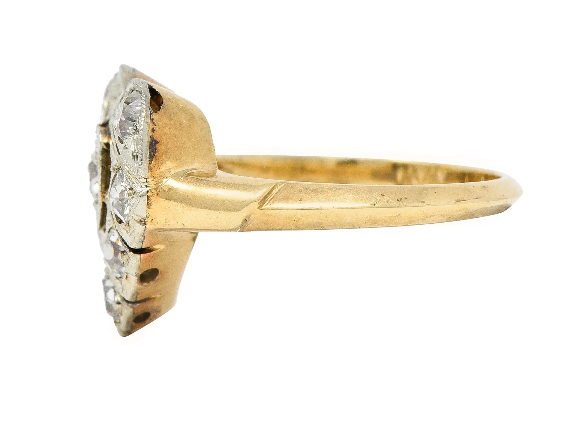 Edwardian 0.74 CTW Diamond Platinum-Topped 14 Karat Gold Antique Heart Ring