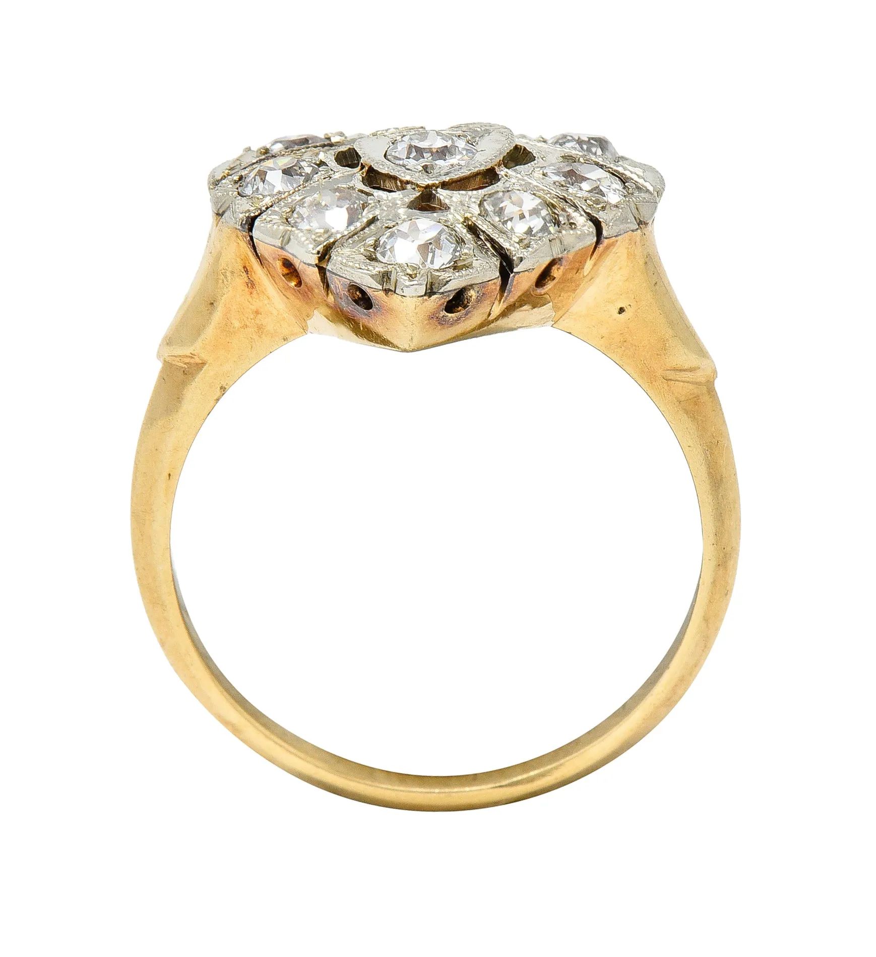 Edwardian 0.74 CTW Diamond Platinum-Topped 14 Karat Gold Antique Heart Ring