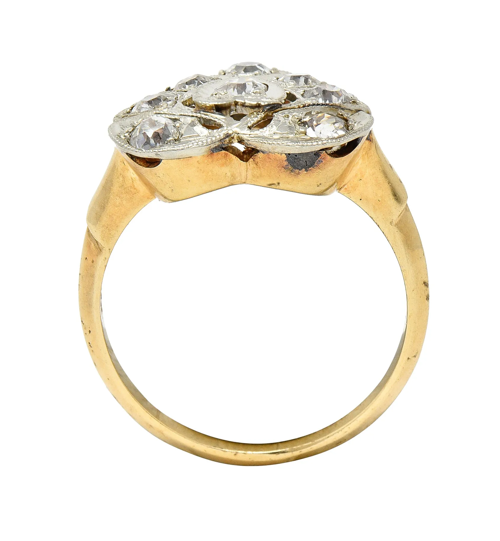 Edwardian 0.74 CTW Diamond Platinum-Topped 14 Karat Gold Antique Heart Ring