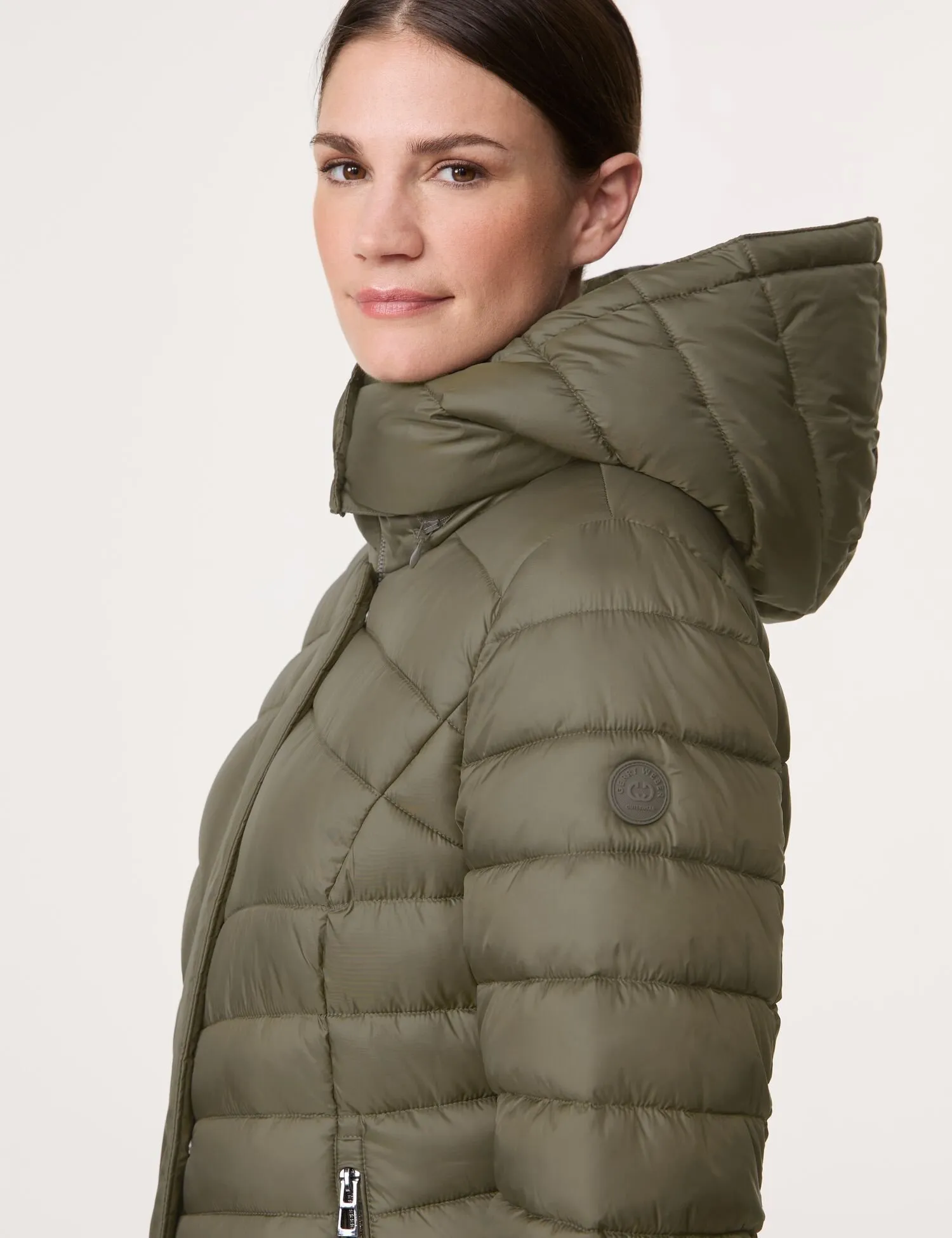 Quilted jacket with a detachable hood