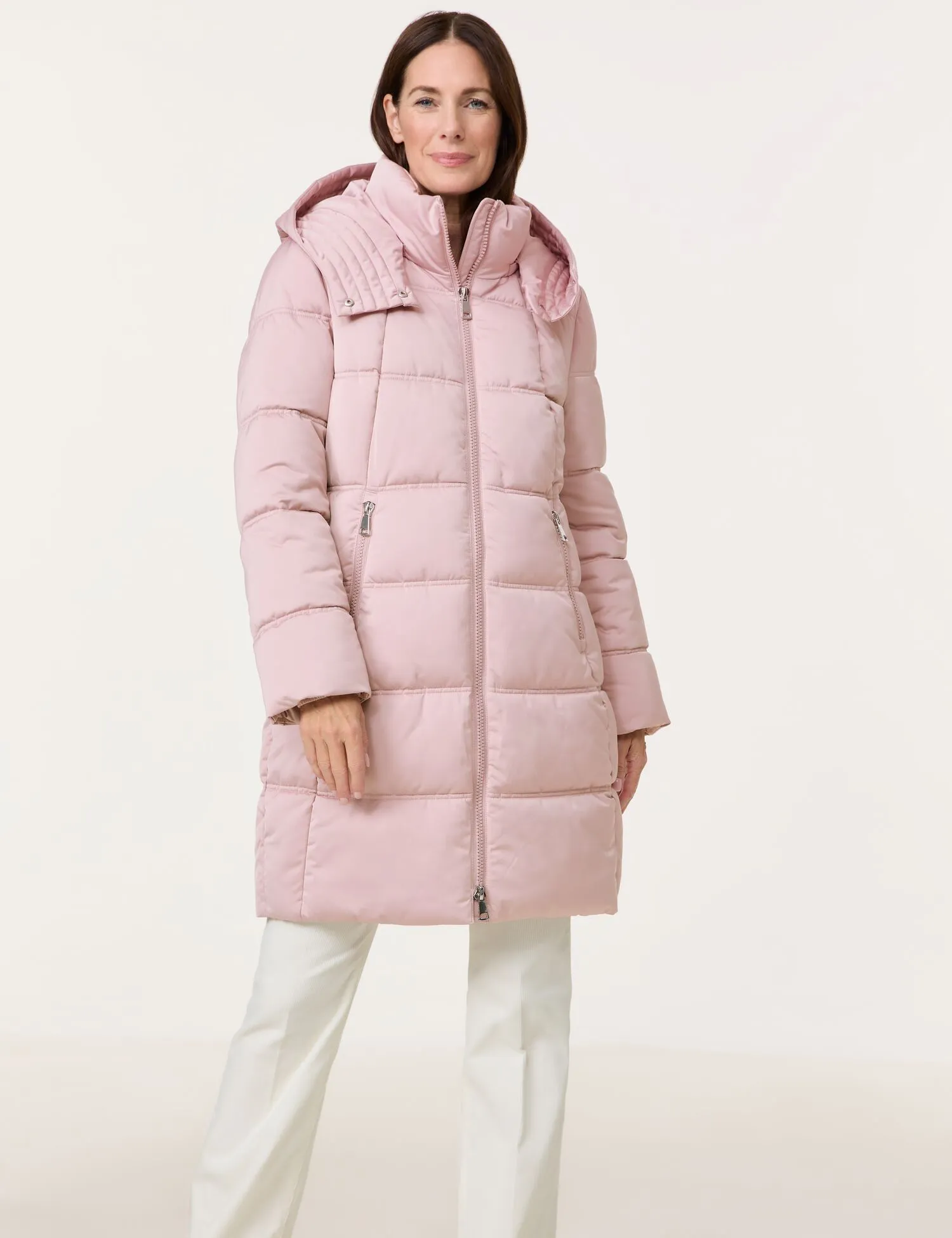 Short quilted coat with a detachable hood